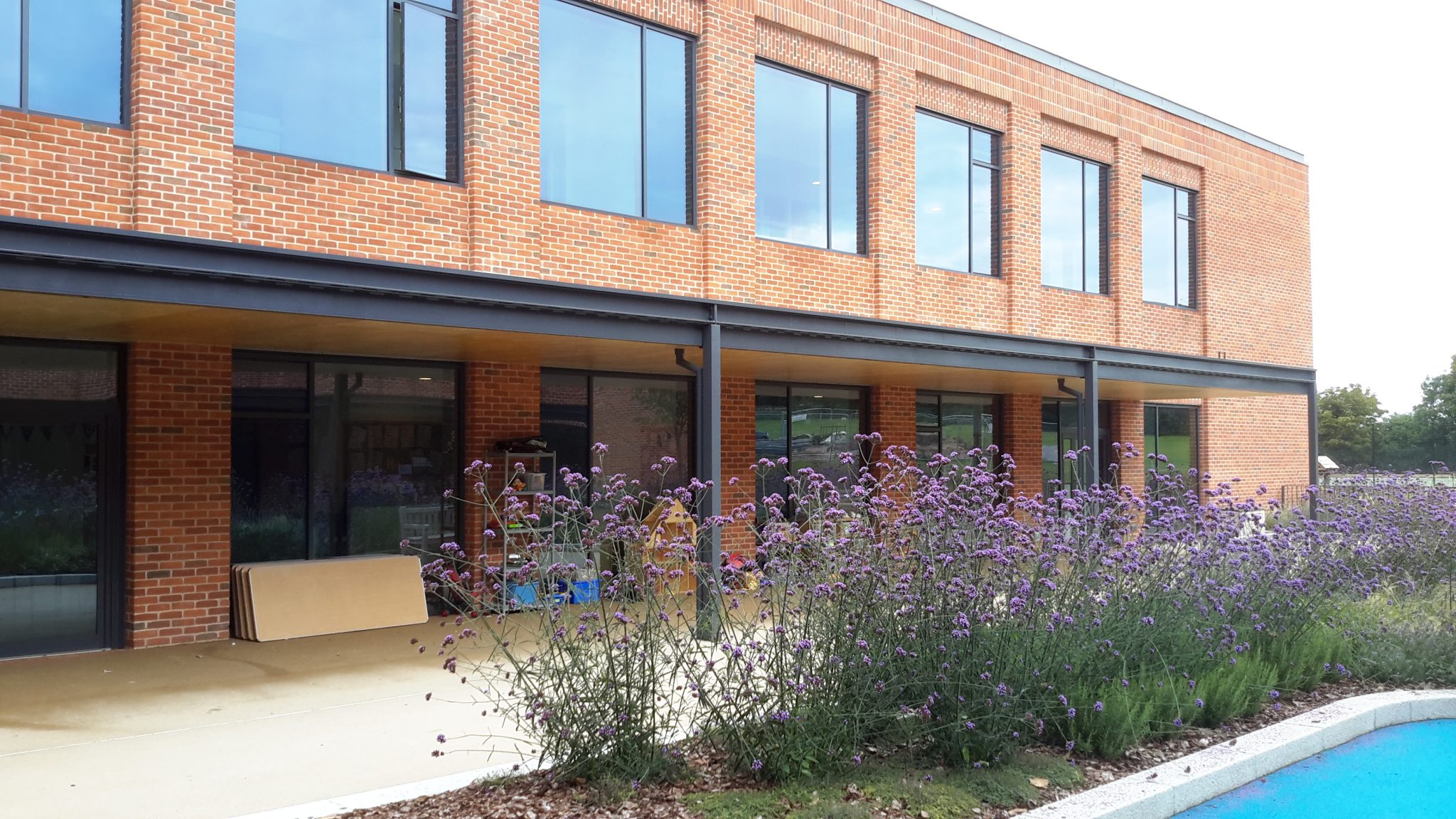 Hybrid composite curtain walling installed in school building